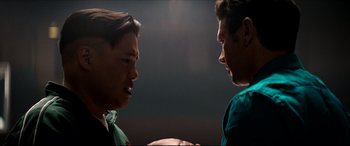 Movie still from “The Interview” (2014), directed by Evan Goldberg – Two young men standing next to each other in a room; Close Up shot, Low angle