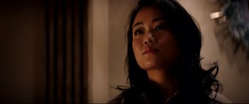 Movie still from “The Interview” (2014), directed by Evan Goldberg – A person with long black hair; Close Up shot, Low angle