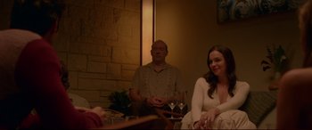 Movie still from “The Invitation” (2015), directed by Karyn Kusama – A man and a woman sitting in front of wine glasses; Medium shot, Over the shoulder angle