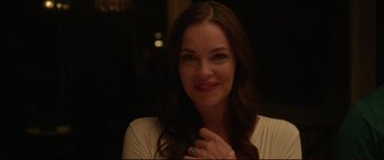Movie still from “The Invitation” (2015), directed by Karyn Kusama – A person with long brown hair; Close Up shot, Over the shoulder angle