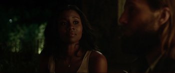 Movie still from “The Invitation” (2015), directed by Karyn Kusama – A person with long black hair; Close Up shot, Over the shoulder angle