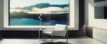 Movie still from “The Island” (2005), directed by Michael Bay – A chair and a table in front of a large window; Extreme Wide shot, High angle