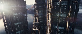 Movie still from “The Island” (2005), directed by Michael Bay – A view of a city from a tall building looking down; Extreme Wide shot, High angle