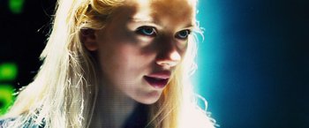 Movie still from “The Island” (2005), directed by Michael Bay – A person with long blonde hair; Close Up shot, Low angle