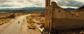 Movie still from “The Island” (2005), directed by Michael Bay – An abandoned building in the middle of nowhere; Extreme Wide shot, High angle