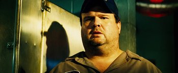 Movie still from “The Island” (2005), directed by Michael Bay – A person wearing a hat; Close Up shot, Low angle