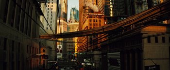 Movie still from “The Island” (2005), directed by Michael Bay – A view of a city street with buildings in the background; Extreme Wide shot, High angle