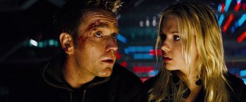 Movie still from “The Island” (2005), directed by Michael Bay – A man and a woman looking at one another; Close Up shot, Low angle