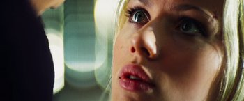 Movie still from “The Island” (2005), directed by Michael Bay – A woman's eyes and lips; Extreme Close Up shot, Low angle