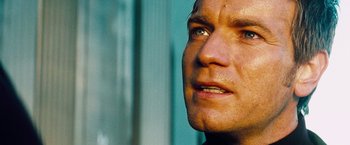 Movie still from “The Island” (2005), directed by Michael Bay – A man's face looking up; Close Up shot, Low angle