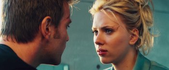 Movie still from “The Island” (2005), directed by Michael Bay – A man and a woman face to face in front of a wall; Close Up shot, Over the shoulder angle