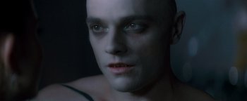 Movie still from “Queen of the Damned” (2002), directed by Michael Rymer – A person wearing a white mask; Close Up shot, High angle