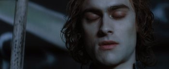 Movie still from “Queen of the Damned” (2002), directed by Michael Rymer – A person's eyes and face; Close Up shot, Overhead angle