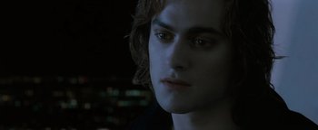 Movie still from “Queen of the Damned” (2002), directed by Michael Rymer – A person with long hair; Close Up shot, Over the shoulder angle