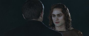 Movie still from “Queen of the Damned” (2002), directed by Michael Rymer – A man looking at himself in the mirror; Close Up shot, Over the shoulder angle