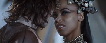 Movie still from “Queen of the Damned” (2002), directed by Michael Rymer – A woman's face with her eyes closed; Close Up shot, Over the shoulder angle