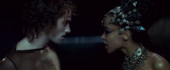 Movie still from “Queen of the Damned” (2002), directed by Michael Rymer – A man and a woman face to face in the dark; Close Up shot, Overhead angle