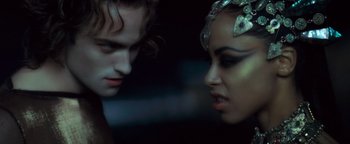 Movie still from “Queen of the Damned” (2002), directed by Michael Rymer – A man and a woman face to face in the dark; Close Up shot, Over the shoulder angle