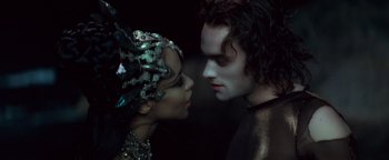 Movie still from “Queen of the Damned” (2002), directed by Michael Rymer – A man and a woman face to face in the dark; Close Up shot, Over the shoulder angle