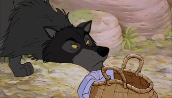 Movie still from “The Jungle Book” (1967), directed by Wolfgang Reitherman – A cartoon of a wolf holding a basket in its mouth; Medium shot, High angle