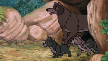 Movie still from “The Jungle Book” (1967), directed by Wolfgang Reitherman – A couple of dogs standing next to each other on the ground; Wide shot, High angle