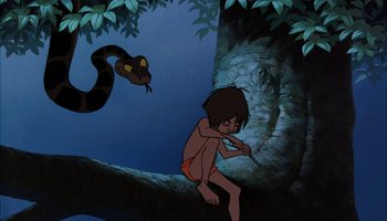 Movie still from “The Jungle Book” (1967), directed by Wolfgang Reitherman – The jungle book is being watched by a snake; Wide shot, Low angle