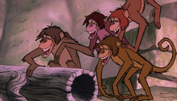 Movie still from “The Jungle Book” (1967), directed by Wolfgang Reitherman – A group of monkeys standing next to each other; Wide shot, Low angle