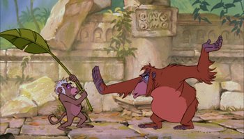 Movie still from “The Jungle Book” (1967), directed by Wolfgang Reitherman – Two monkeys are fighting in a jungle setting; Wide shot, Over the shoulder angle