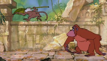 Movie still from “The Jungle Book” (1967), directed by Wolfgang Reitherman – A monkey and a monkey on a brick road; Wide shot, Low angle