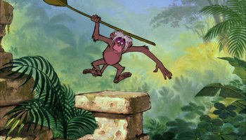 Movie still from “The Jungle Book” (1967), directed by Wolfgang Reitherman – An animated monkey swinging a stick on top of a wall; Wide shot, Low angle