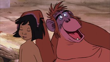 Movie still from “The Jungle Book” (1967), directed by Wolfgang Reitherman – A woman and a monkey in the jungle book; Close Up shot, Low angle