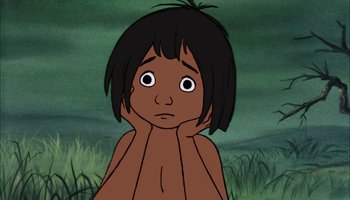 Movie still from “The Jungle Book” (1967), directed by Wolfgang Reitherman – A cartoon picture of mowgli from the jungle book; Close Up shot, High angle