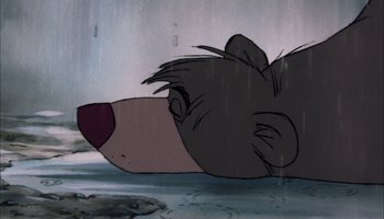 Movie still from “The Jungle Book” (1967), directed by Wolfgang Reitherman – A cartoon bear's face in the water; Close Up shot, Low angle