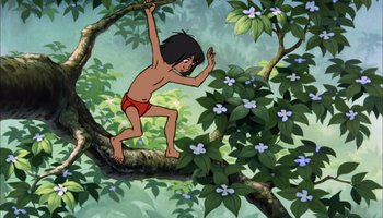 Movie still from “The Jungle Book” (1967), directed by Wolfgang Reitherman – A cartoon picture of mowgli hanging from a tree branch; Wide shot, Low angle