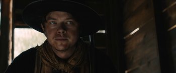 Movie still from “The Kid” (2019), directed by Vincent D'Onofrio – A person wearing a hat; Close Up shot, Low angle