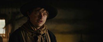 Movie still from “The Kid” (2019), directed by Vincent D'Onofrio – A person wearing a hat; Close Up shot, Low angle