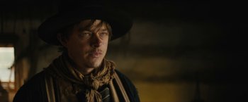 Movie still from “The Kid” (2019), directed by Vincent D'Onofrio – A person wearing a hat; Close Up shot, Low angle