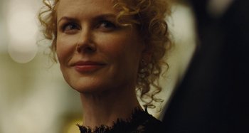 Movie still from “The Killing of a Sacred Deer” (2017), directed by Yorgos Lanthimos – A person with curly hair; Close Up shot, Over the shoulder angle