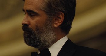 Movie still from “The Killing of a Sacred Deer” (2017), directed by Yorgos Lanthimos – A person wearing a suit and tie; Close Up shot, Low angle