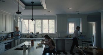 Movie still from “The Killing of a Sacred Deer” (2017), directed by Yorgos Lanthimos – A man and a woman in a kitchen; Wide shot, Low angle