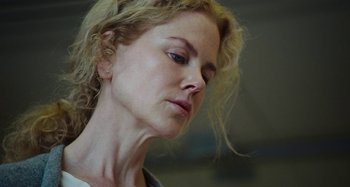 Movie still from “The Killing of a Sacred Deer” (2017), directed by Yorgos Lanthimos – A person wearing a white shirt; Close Up shot, Low angle