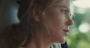Movie still from “The Killing of a Sacred Deer” (2017), directed by Yorgos Lanthimos – A woman's face with ear piercings; Close Up shot, Low angle