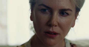 Movie still from “The Killing of a Sacred Deer” (2017), directed by Yorgos Lanthimos – A woman's face in a white room; Close Up shot, Over the shoulder angle