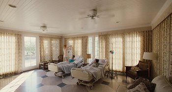 Movie still from “The Killing of a Sacred Deer” (2017), directed by Yorgos Lanthimos – A woman and a child in a room with two hospital beds; Extreme Wide shot, High angle