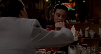 Movie still from “The King of Comedy” (1982), directed by Martin Scorsese – A woman sitting at a table in front of a man; Close Up shot, Over the shoulder angle