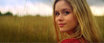 Movie still from “The Kings of Summer” (2013), directed by Jordan Vogt-Roberts – A person with long blonde hair; Close Up shot, Low angle