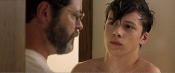 Movie still from “The Kings of Summer” (2013), directed by Jordan Vogt-Roberts – A man and a woman looking at each other; Close Up shot, Over the shoulder angle