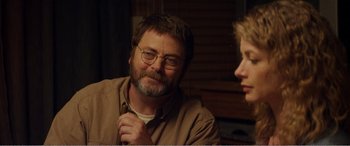 Movie still from “The Kings of Summer” (2013), directed by Jordan Vogt-Roberts – A person wearing glasses and a brown shirt; Close Up shot, Over the shoulder angle