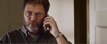 Movie still from “The Kings of Summer” (2013), directed by Jordan Vogt-Roberts – A person talking on a cell phone; Close Up shot, Low angle