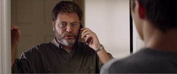 Movie still from “The Kings of Summer” (2013), directed by Jordan Vogt-Roberts – A person talking on a cell phone; Close Up shot, Over the shoulder angle